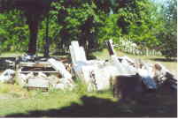abandoned gravestones in a cemetary in Starsow, Mecklenburg, Germany abandoned gravestones in a cemetary in Starsow, Mecklenburg, Germany